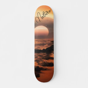 Patineta con la puesta del mar skateboard