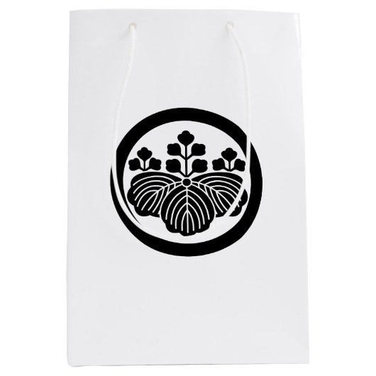 Paulownia mit 5-3 Blüten im Kreis Mittlere Geschenktüte (Vorderseite)