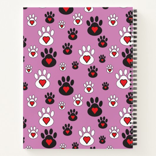Paw druckt mit roten Herzen auf rosa Notizblock (Rückseite)