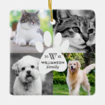 Paw Print Monogram Four Foto Family Pet Collage Keramikornament<br><div class="desc">Feiern Sie die magische und festliche Urlaubssaison mit unserem individuellen Foto für Haustiere. Unser modernes,  elegantes Urlaubsdesign besticht durch ein modernes und minimalistisches 4-Foto-Collage-Layout mit einem modernen,  weißen Pfotenprint-Design inmitten der viereckigen Collage des Fotos. Anpassen mit Ihrem Familienmonogramm,  Jahr und Namen.</div>