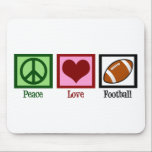 Peace Liebe Football Mousepad<br><div class="desc">Ein hübsches Friedenszeichen,  ein Herz und ein Fußballgeschenk für einen Trainer,  der an seine Mannschaftsspieler weitergeben kann. Eine Fußballmuttermaus ist eine großartige Möglichkeit,  Computer und Sport zu kombinieren.</div>