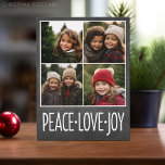 Peace Liebe Joy Chalkboard 4 Foto Collage Feiertagspostkarte<br><div class="desc">Verwenden Sie 4 quadratische oder instagram Bilder,  um ein einzigartiges und trendiges fröhliches Weihnachtsmemento zu machen. Wenn Sie etwas bewegen möchten,  klicken Sie auf die Schaltfläche Anpassen,  um Änderungen vorzunehmen.</div>