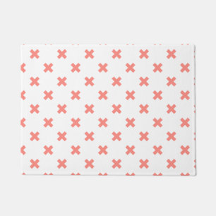 Peach cross stitches auf weiß fußmatte