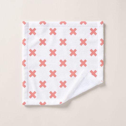 Peach cross stitches auf weiß waschlappen (Waschlappen)