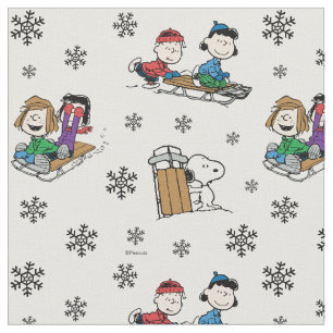 Peanuts-Gruppe Schlittenfahren und Schneeflocken Stoff