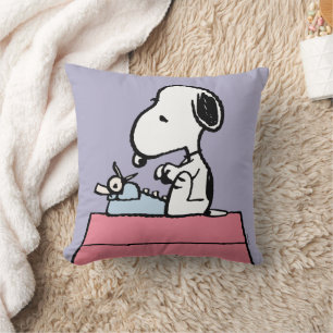 Peanuts Snoopy an der Schreibmaschine Kissen