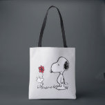 Peanuts | Snoopy & Woodstock Red & Black Tasche<br><div class="desc">Bring the timeless charm and heartfelt friendship of Peanuts' Snoopy and Woodstock into your life with this delightful collection, featuring their iconic red flower moment. This classic illustration captures Woodstock sweetly presenting a flower to his best pal, making every item in this collection a pure joy to own or gift!...</div>