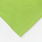 Pekingese auf Green Fleecedecke (Ecke)