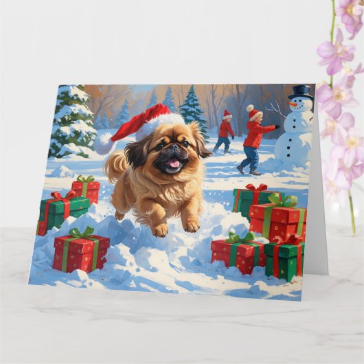 Pekingese Hund läuft im Schnee mit Weihnachtshut Karte (Orchidee)