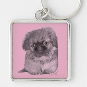 Pekingese-Welpe auf Rosa Schlüsselanhänger