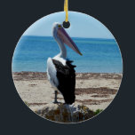 Pelican On Beach Rock, Keramikornament<br><div class="desc">Stehend auf einem Stein am Meer ist ein hungrig hübscher Pelikan,  der für tasy-Fische-Muscheln gewartet ist.</div>