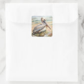 Pelican on the Beach Quadratischer Aufkleber (Tasche)