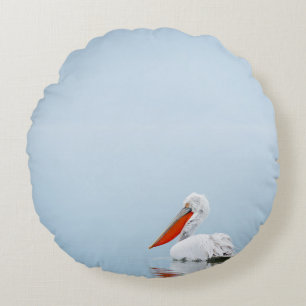 PELIKAN AUF BLAUEM WASSER RUNDES KISSEN