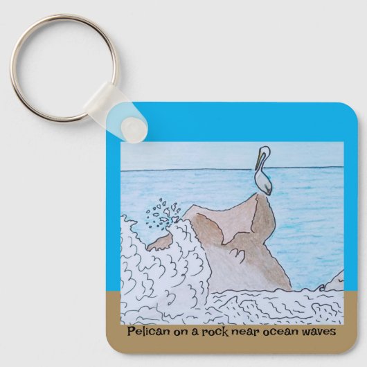Pelikan auf einem Felsen in der Nähe von Ozeanwell Schlüsselanhänger (Vorderseite)