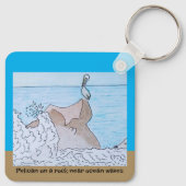 Pelikan auf einem Felsen in der Nähe von Ozeanwell Schlüsselanhänger (Rückseite)