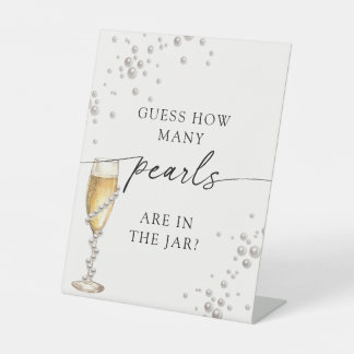 Perlen & Prosecco Schätze wie viele Perlen Spiel S Sockelschild