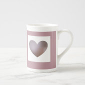 Perlen- und Cremeherzschale (lila) Porzellantasse (Rechts)