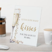 Perlen und Prosecco schätzen, wie viele Kisses Gam Sockelschild (In SItu)