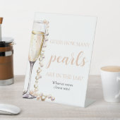 Perlen und Prosecco schätzen, wie viele Perlen spi Sockelschild (In SItu)