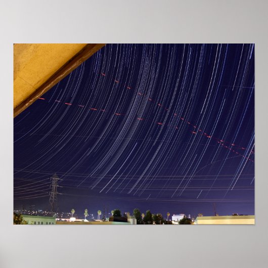 Perseid-Sternspuren über Stadtlichtern Poster (Vorne)