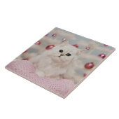 Persische Katze, die auf rosa Kissen sitzt Fliese (Seite)