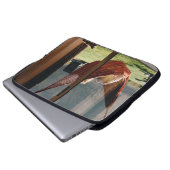 Person auf brauner Schaukel Laptopschutzhülle (Vorne Knopf)