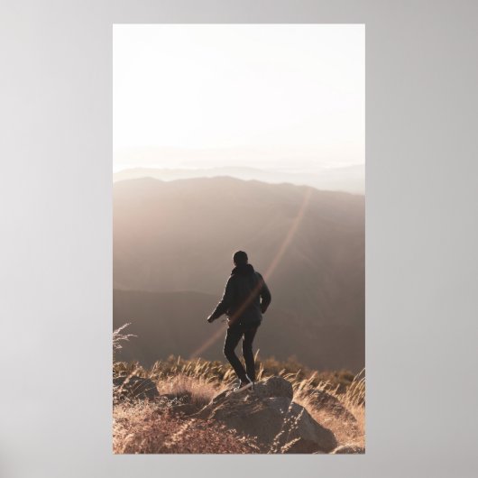 Person auf Felsen stehend Poster (Vorne)