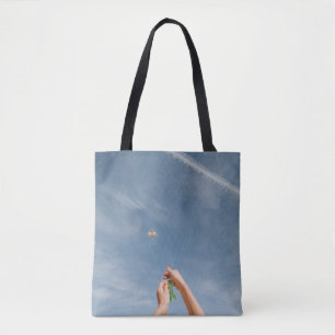 Person, die morgens Drachen fliegt Tasche