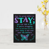 Person hinter Suizidprävention Depression Awaren Karte (Gelbe Blume)