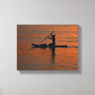 Person silhoutte Kajak am Fluss Leinwanddruck