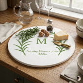Personaler grüner botanischer Kranz Monogramm rund Schneidebrett