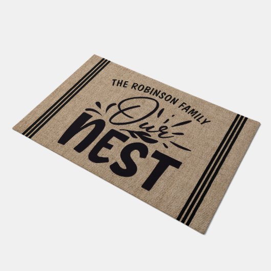 Personalisiert ADD NAME Unser Nest Willkommen Fußmatte (Schrägansicht)