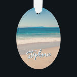 Personalisiert Beach Foto Blue Landschaftlich Ornament<br><div class="desc">Ein schönes Vintages Foto eines Strandes in Kalifornien mit ovalen Weihnachtsschmuck. Passen Sie Ihren Namen an,  um Ihr eigenes personalisiertes Geschenk zu kreieren. Für kürzere Namen gibt es viel Platz,  um den Schriftart zu vergrößern. Es gibt viele schöne,  moderne Kalligraphie-Schriftzeichen zur Auswahl.</div>