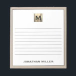 Personalisiert Beige-Linen-Monogramm Notizblock<br><div class="desc">Bleibe im Stil mit diesem personalisierten Beige-Leinen-Notizblock,  das in einem edlen Schwarz-Gold-Monogramm-Design gestaltet ist. Die ausgekleideten Seiten bieten viel Platz für Noten,  Aufgabenlisten und vieles mehr,  während das elegante Design Ihrem Alltag eine Touch Luxus verleiht. Perfekt für den persönlichen Gebrauch oder als nachdenkliches Geschenk für einen Freund oder Kollegen.</div>