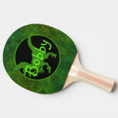 Personalisiert grüner Dinosaurier versteckt Tischtennis Schläger (Seitenansicht)