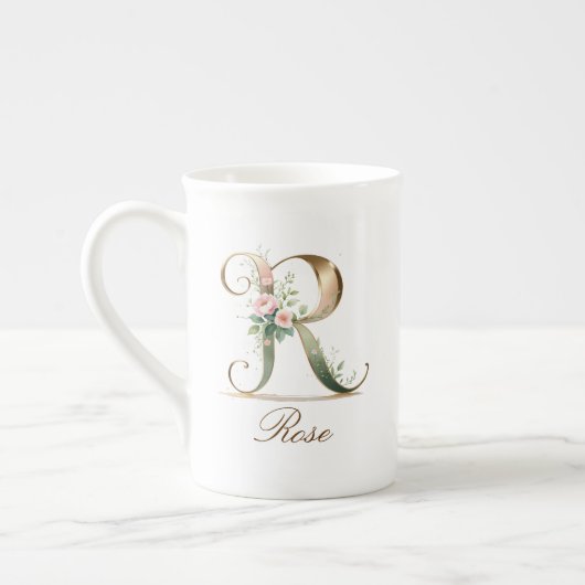 Personalisierte goldene Blumenmonogramm-Initiale R Porzellantasse (Links)
