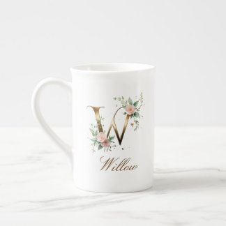 Personalisierte goldene Blumenmonogramm-Initiale W Porzellantasse