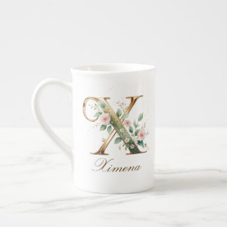 Personalisierte goldene Blumenmonogramm-Initiale X Porzellantasse