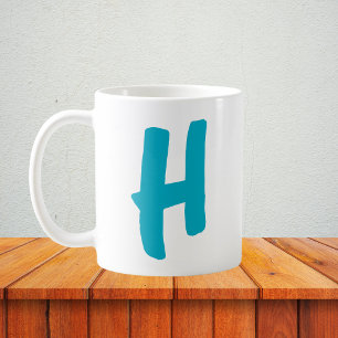 Personalisierte Initialisierung mit fett formatier Kaffeetasse