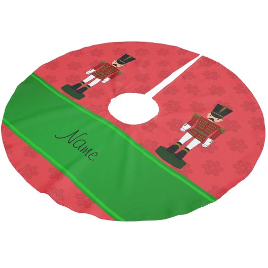 Personalisierte Namensnussknackerrotschneeflocken Polyester Weihnachtsbaumdecke (Schrägansicht)