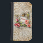 Personalisierte Rose Vintager Damast Phone Geldbeutel<br><div class="desc">Romantisches Vintag-inspiriertes Design mit einem Personalisierungsbereich, umgeben von verzierten Schnörkeln, Vögeln und üppigen Sprays von Rose auf einem bedrückten Damast-Hintergrund. Anmerkung: Skulptierte, eingravierte, geprägte und dimensionale Effekte, geschichtete, gealterte oder erodierte Erscheinung, Texturen und Schatten digital erzielt. Das eigentliche Produkt hat eine flache Oberfläche. Hintergrundpapier des französischen Gartens von Lil Ellaboudy...</div>