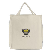 Personalisierte Tennisschläger und Ball bestickt