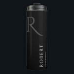 Personalisierte Trauzeugen mit einfacher Schwarzer Thermosbecher<br><div class="desc">Dieser einfache,  kundenspezifische Trauzeugen-Tumbler zeigt den Namen,  das Monogramm und das Hochzeitdatum des personalisierten Trauzeugen. Sie können den Hintergrund und die Farben der Schriftart ganz einfach ändern,  um sie an Ihre Veranstaltung anzupassen. Auch gut für einen Trauzeuge,  Vater der Braut und mehr.</div>