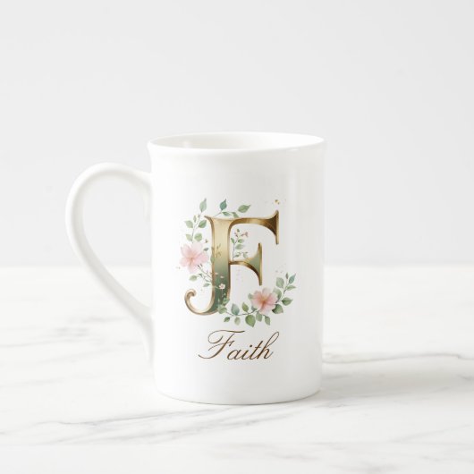 Personalisierter goldener Blumenmonogramm-Initiale Porzellantasse (Links)