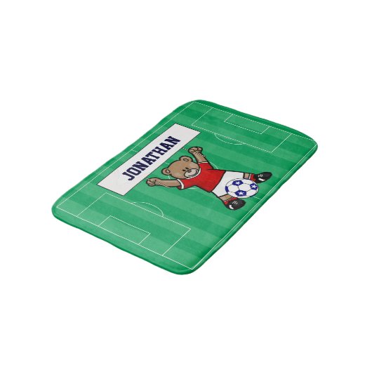 Personalisierter Niedlicher Fußballteddybär (rot) Badematte (Schrägansicht)