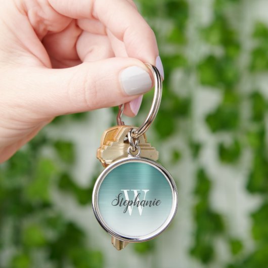 Personalisierter Schlüsselanhänger aus grün gebürs (Hand)