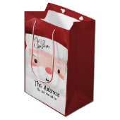 Personalisierter Weihnachtsmann frohe Weihnachten Mittlere Geschenktüte (Vorderseite Schrägansicht)
