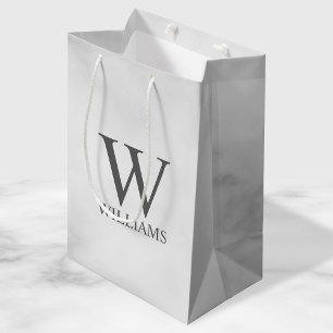 Personalisiertes Monogramm aus weißem Marmor und  Mittlere Geschenktüte