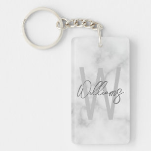 Personalisiertes Monogramm und Name für das weiße Schlüsselanhänger