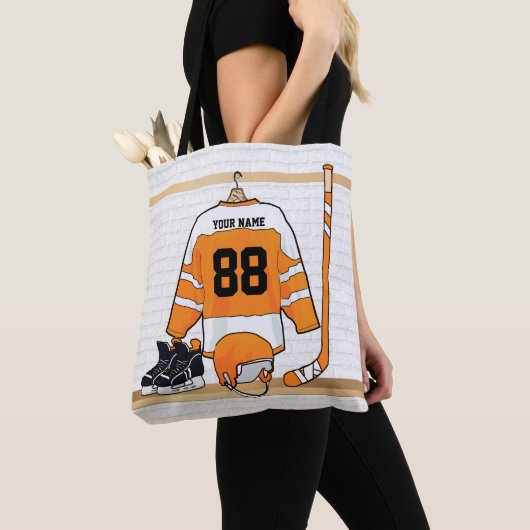 Personalisiertes Orange- und Weißeisenhockey Jerse Tasche (Von Nahem)